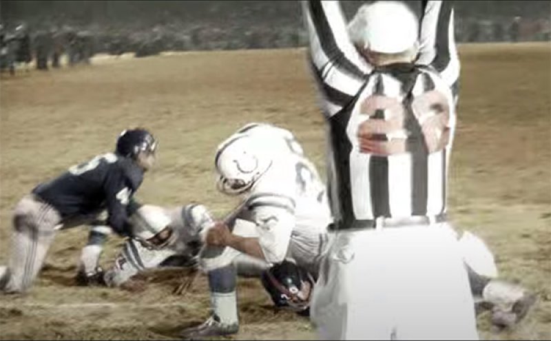 Baltimore Colts running back Alan Ameche plunges over the goal line for the winning touchdown of the  1958 NFL Championship. Screenshot via YouTube.