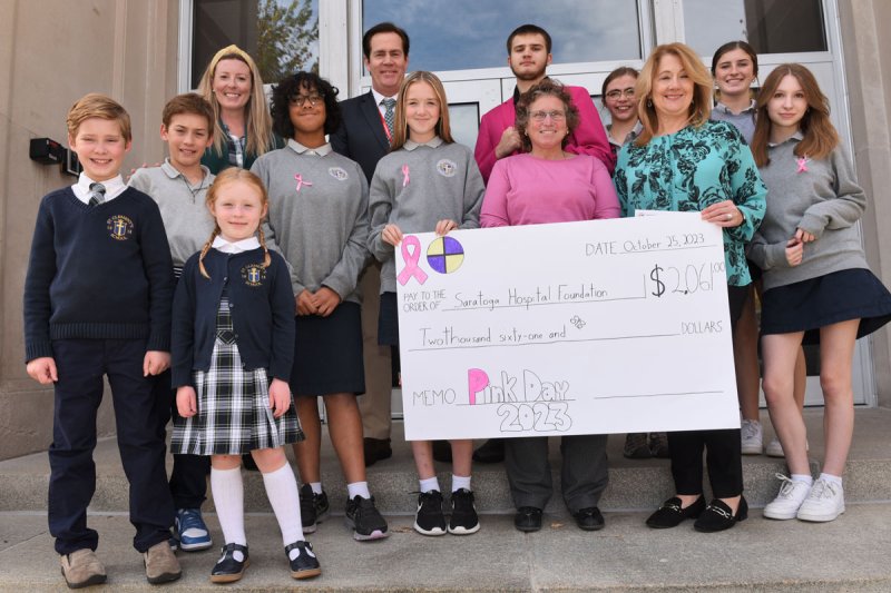 Representatives and students from Saratoga Central Catholic School, St. Mary’s School, and St. Clement’s School presented a check for $2,061 to Renée Russell, director of the Mollie Wilmot Radiation Oncology Center, on Oct. 25. Not pictured are SCC student council members Ellie Grace, Rebecca Schnefel, and Sydney Caracci (Photo by Super Source Media).