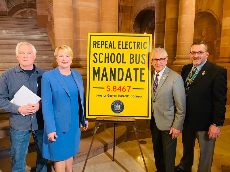 Pictured left to right: Burnt Hills-Ballston Lake School District Bus Mechanic Robert Killeen, Assemblywoman Mary Beth Walsh, State Senator Jim Tedisco, and Director of Pupil Transportation for the Shenendehowa Central School District Al Karam. Photo provided by Adam Kramer. 