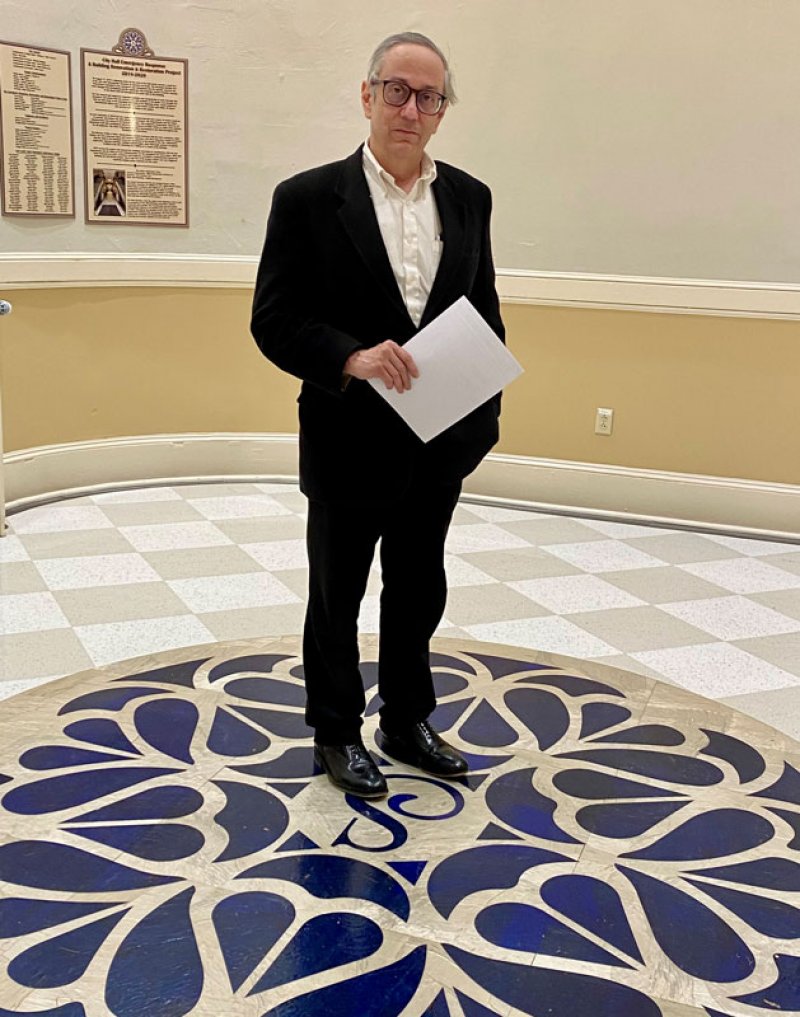 Tony Izzo poses in the foyer outside Saratoga Music Hall just before his appointment as interim city attorney on Feb. 14, 2022