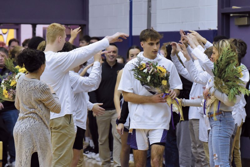 Nick Verdile enters the court during the Scotties’ senior night ceremony on Jan. 11. Photos by Super Source Media Studios.
