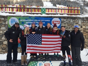 The alpine racing athletes from Team Lake Placid. L to R: NYSEF coach John Norton, Chelsea Smith, Hugh Dempsey, Aiden Smith, Andrea Reynolds, Inez Burkard, Jake Reynolds, and Team Lake Placid Head of Delegation Arthur Lussi.