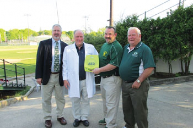 Left to right are Ben Driscoll, Glens Falls Ward Five Common Councilman, Dr. Jack Layden, ACA cardiologist, Hank Pelton, Greenjackets president and alumni, and Don Beaty, Greenjackets alumni.