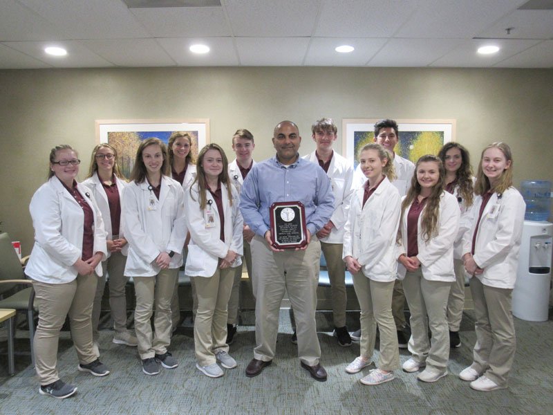 Saratoga Hospital Medical Group – Pulmonary and Sleep Medicine was selected as New Visions Health Careers Exploration’s 2019 Mentor of the Year. Pulmonologist Numan Rashid, MD, accepted the award on behalf of the department and is pictured with New Visions students, listed with their high schools.  Left to right: Nichole Sweenor (Salem), Trinity Kelsey (Ballston Spa), Alexandria Wade (Hartford), Amanda Parsons (Ballston Spa), Autumn Moffitt (Hadley-Luzerne), Kaleb Davie (Minerva), Numan Rashid, MD (Saratoga Hospital Medical Group), R. Brady Lybert, (Cambridge), Alana Martin (Saratoga Springs), Jared Everleth (Schuylerville), Macie Clarke  (Hadley-Luzerne), Grace Catalfimo (Saratoga Springs), and Jessica Skelly (Hadley-Luzerne).