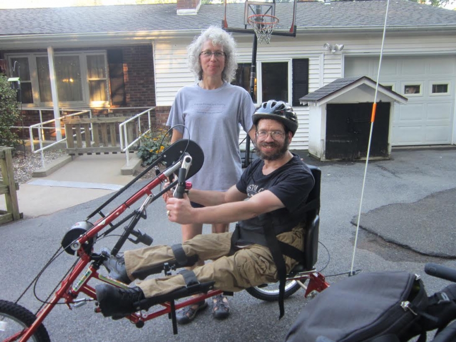Remis with his sister and his new handcycle.