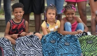 Nearly 750 Backpacks Assembled and Delivered to Children in Need