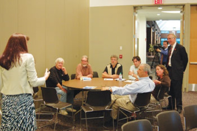 Left, Margaret Irwin directs a group during the first of several public workshops on the City’s comprehensive plan. Also pictured is, standing, far right, Charles Wait, one of 15 committee members.