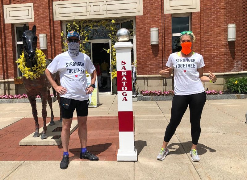 Alexandra Besso and Simon Wood ran over 50 miles to support  Downtown Business. Photo courtesy of Alexandra Besso.