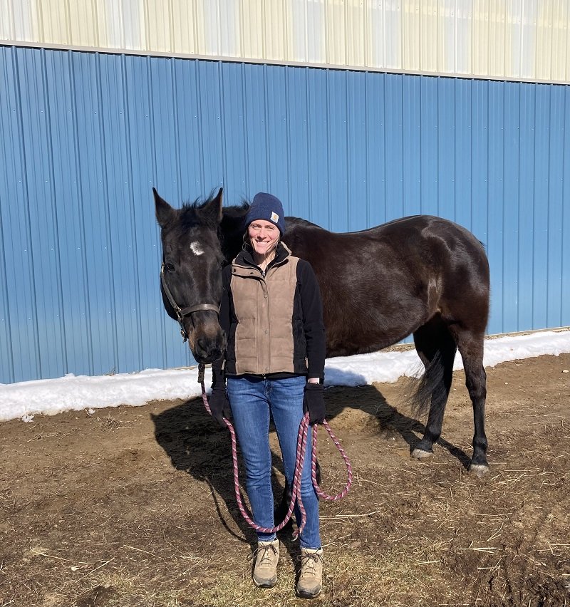 Program Manager Ashley Clothier and therapy horse Frankie Laine.  Photo provided.