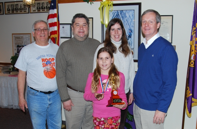 Pictured with Morgan Brooking (front middle) are (l-r) Wilton-Elks Lodge Treasurer Michael Cummins, parents Bill Brooking and Victoria Brooking, and Lodge Hoop Shoot Chairman Steve Dorsey. Photo courtesy of Dave Kraus.
