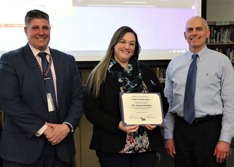 From left: Ballston Spa Central School District interim superintendent  Dr. Gianleo Duca, TCT Federal Credit Union community relations manager Jeannie Dickinson, and BSCSD Board of Education President Jason Fernau (Photo provided by Ballston Spa Central School District).