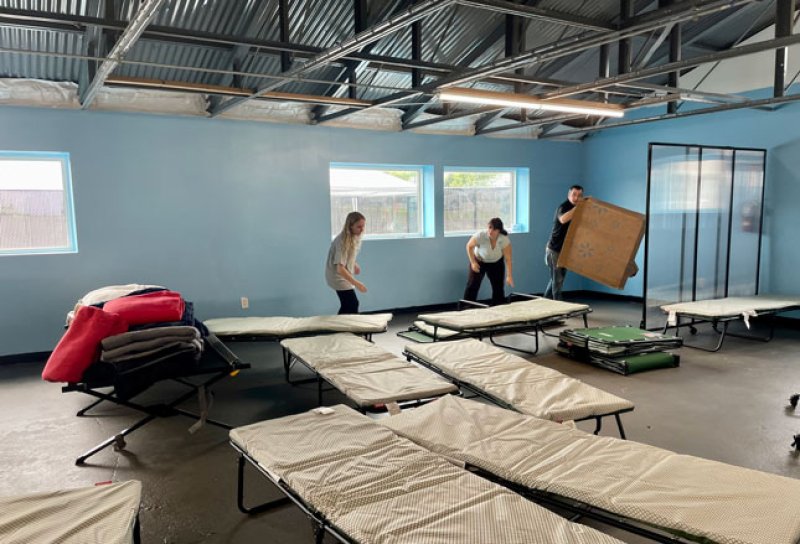 Skidmore College students help prepare a homeless shelter on Adelphi Street in Saratoga Springs. Photo via Skidmore College.