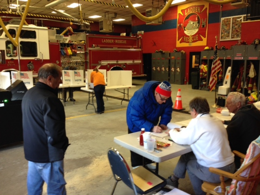 Voters and election officials do their civic duty on March 21 inside the Eagle Matt Lee fire station in Ballston Spa. 