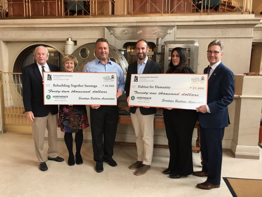 The Saratoga Builders Association is proud to present a total of $63,000 to our two local charities from the proceeds of the 2018 Saratoga Showcase of Homes. From left to right: Barry Potoker, Executive Director- Saratoga Builders Association and Showcase Co-Chair, Michelle Larkin, Executive Director -Rebuilding Together Saratoga County, Dave Trojanski, President of Saratoga Builders Association, Adam Feldman, Executive Director – Habitat for Humanity of Northern Saratoga, Warren and Washington Counties, Lisa Licata, Showcase Co-Chair, Stephan von Schenk, President and CEO-Adirondack Trust Company.