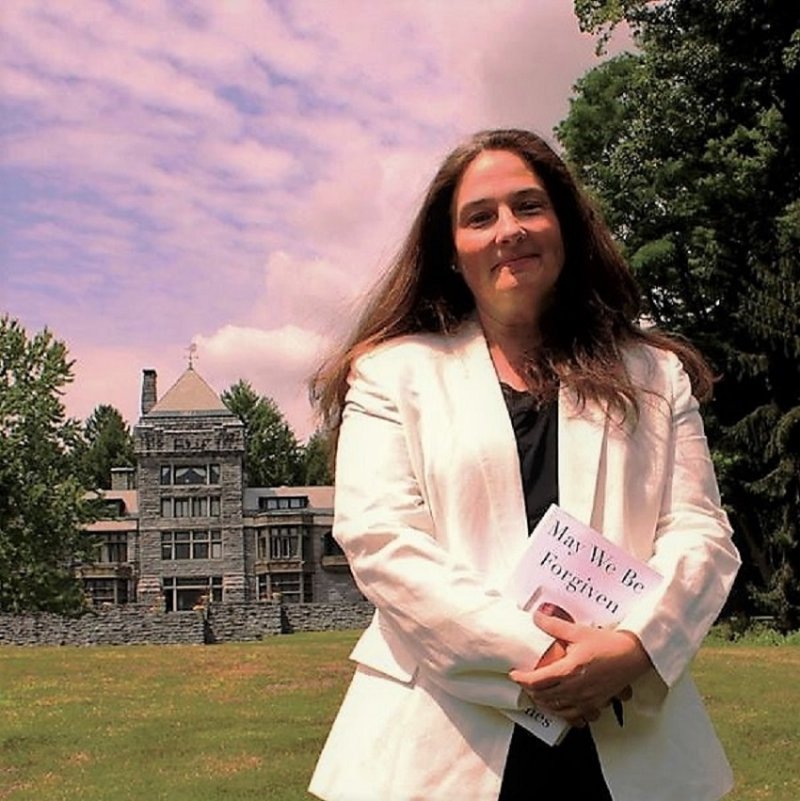 Renowned author and former Yaddo Board co-chair A.M. Homes poses for a picture on the Yaddo lawn in July 2014, prior to the multimillion-dollar restoration project on the mansion. Photo by Thomas Dimopoulos.