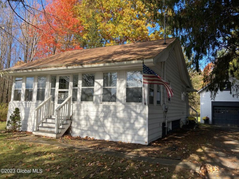 This cozy cottage at 2699 NYS  Rt 29 in Middle Grove was listed by Neil Corkery of Roohan Realty and sold for $170,000