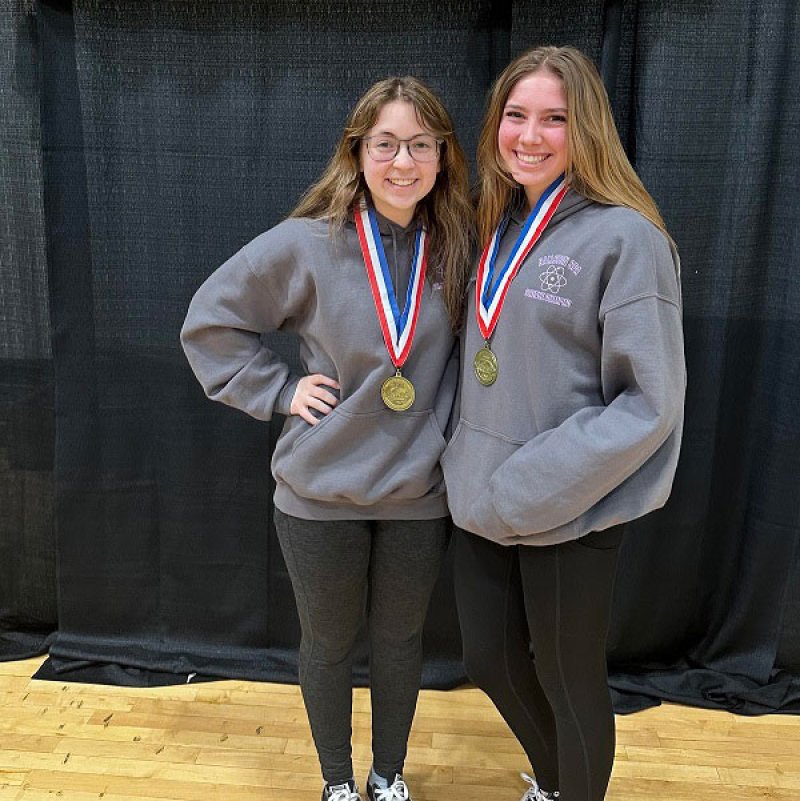 Maddie Burns (left) and Lee McKinley (right) captured a gold medal in the ‘Write-It Do-It’ event at the 2023 NYS Science Olympiad Tournament in Syracuse. Photo provided by Ballston Spa Central School District.