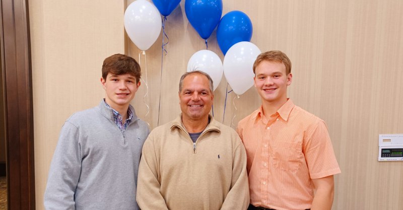 Left to right: Brendan Young, Coach DiFusco, and Zach Bell. Photo provided. 