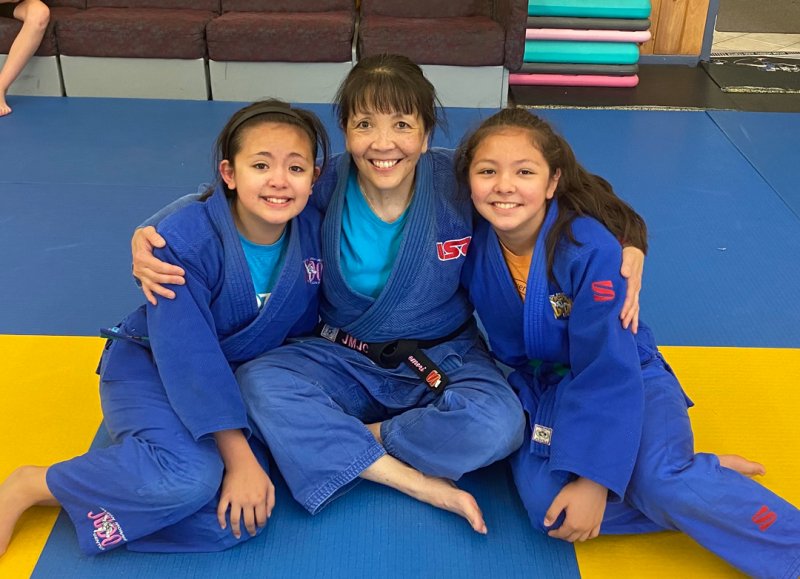 Teri Takemori with her twins, Randi (left) and Dani (right).