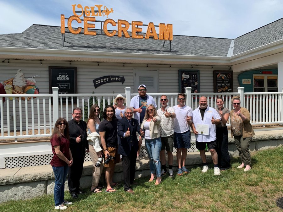 The owners of Ugly Ice Cream celebrate their shop’s recent opening with State Senator Jim Tedisco and other community members. Photo by Jonathon Norcross. 