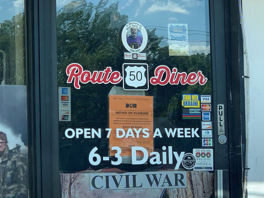 A New York State Department of Health Notice of Closure hangs on the front door of the Route 50 Diner in Ballston Spa. Photo by Jonathon Norcross.
