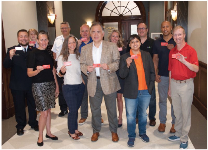 City of Saratoga Springs Mayor Ron Kim joined with area business and nonprofit leaders associated with the  Saratoga County Alliance to End Homelessness to kick-off an effort to distribute Saratoga Cares cards to local downtown businesses on July 25. Photo provided.
