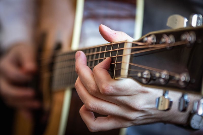 Fingers across a fretboard – The Park Theatre Foundation presents  Live &amp; Local: Songwriters Showcase May 25. Photo provided.