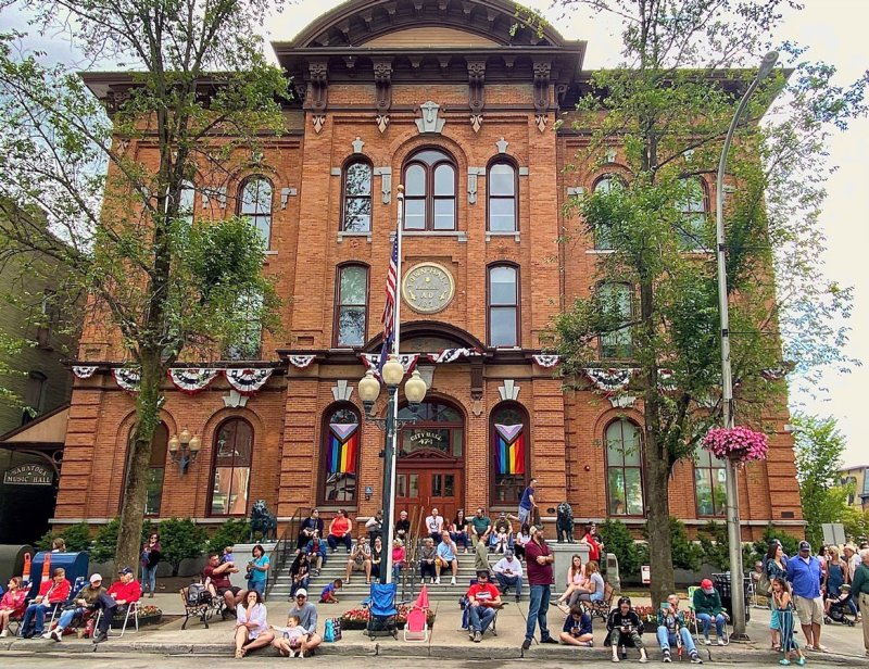 Onlookers assemble on the steps outside Saratoga Springs City Hall during the 54th annual Elks Flag Day Parade, which took place Saturday June 3, 2023. Photo by Thomas 