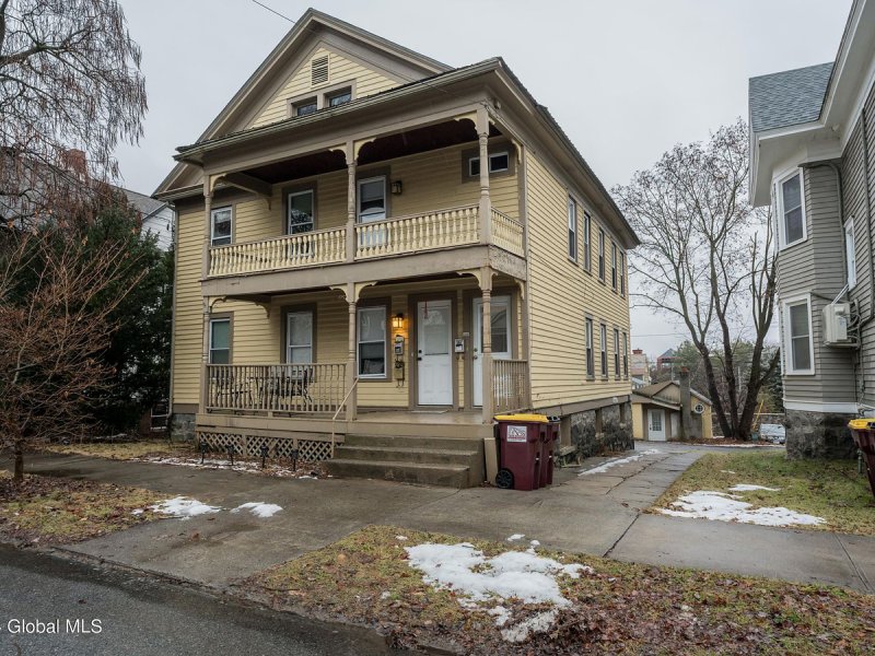This downtown duplex at 130 Woodlawn Ave in Saratoga Springs  was listed by Kate Naughton and Chris Benton from Roohan Realty  and sold for $750,000.