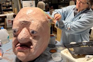 Community Members Building Giant Puppets to March in Parade